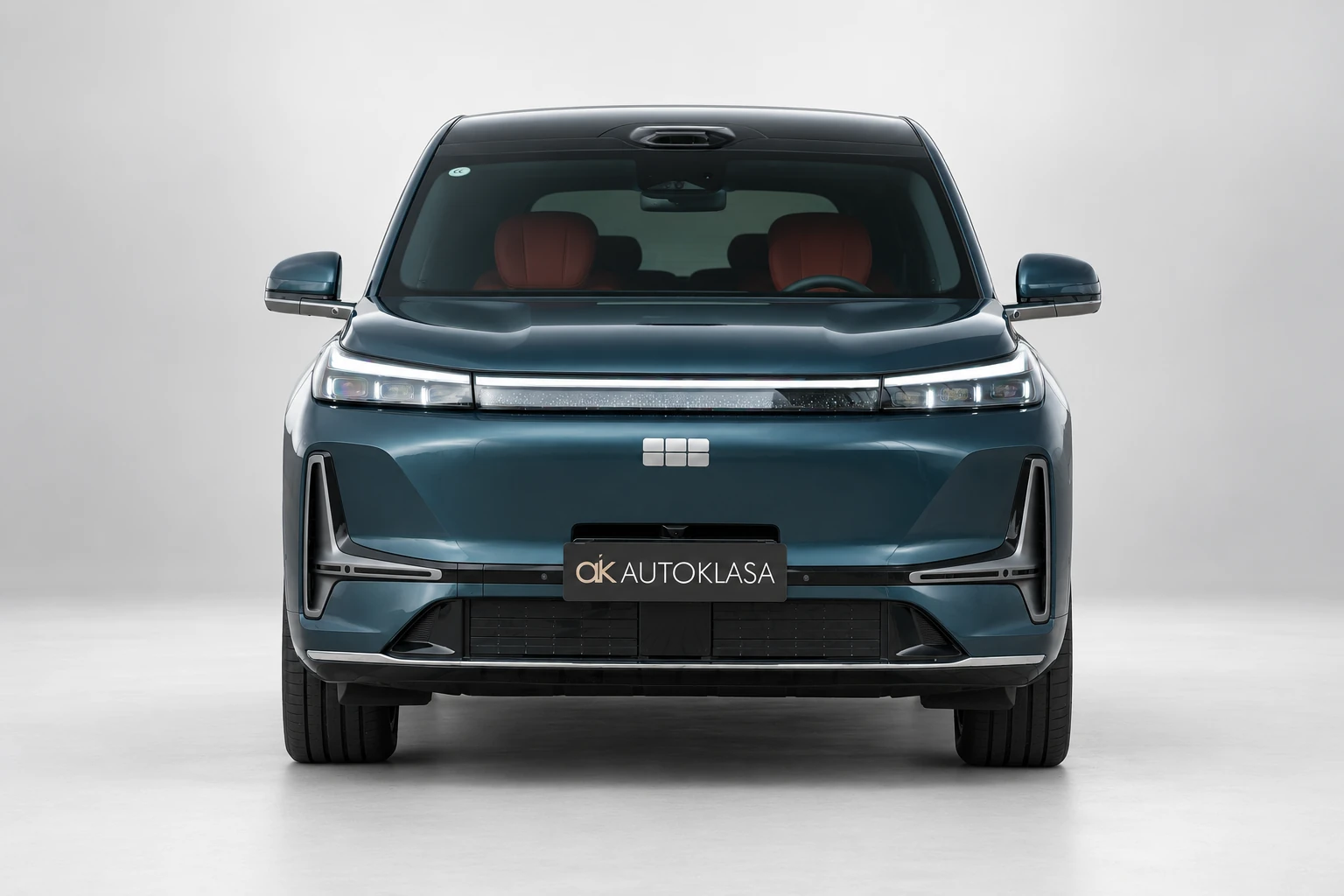 Geely Galaxy M9 w centralnym kadrze z przodu, z dachem i przednią listwą świateł.